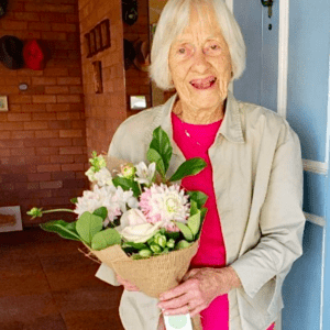 Little Flowers recipient with little bouquet