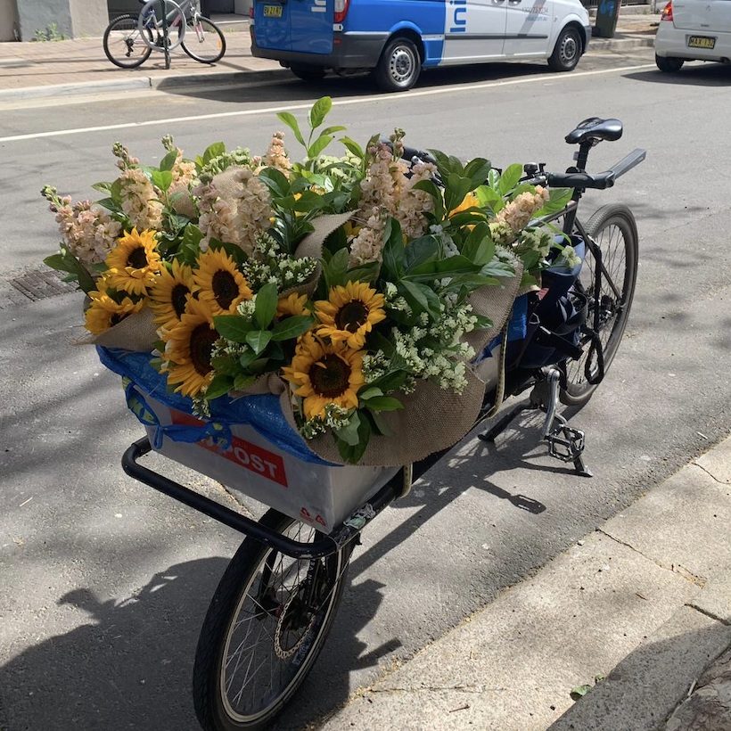 Sunflowers and stock on a delivery bike in Surry Hills, Sydney