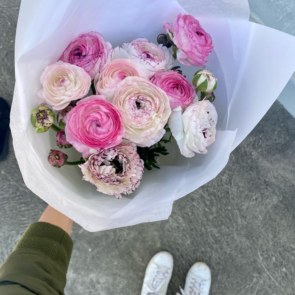 Bouquet of pink ranunculus with mottled petals