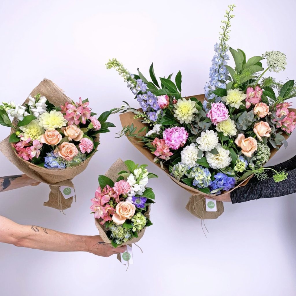 Three Little Flowers bunches side by side in small, regular, and Luxe sizes