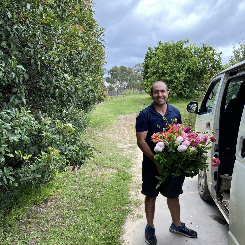 Collecting flowers directly from one of our local growers